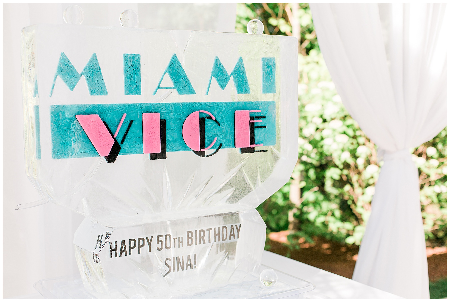 a Miami vice themed ice luge for a 50th birthday party