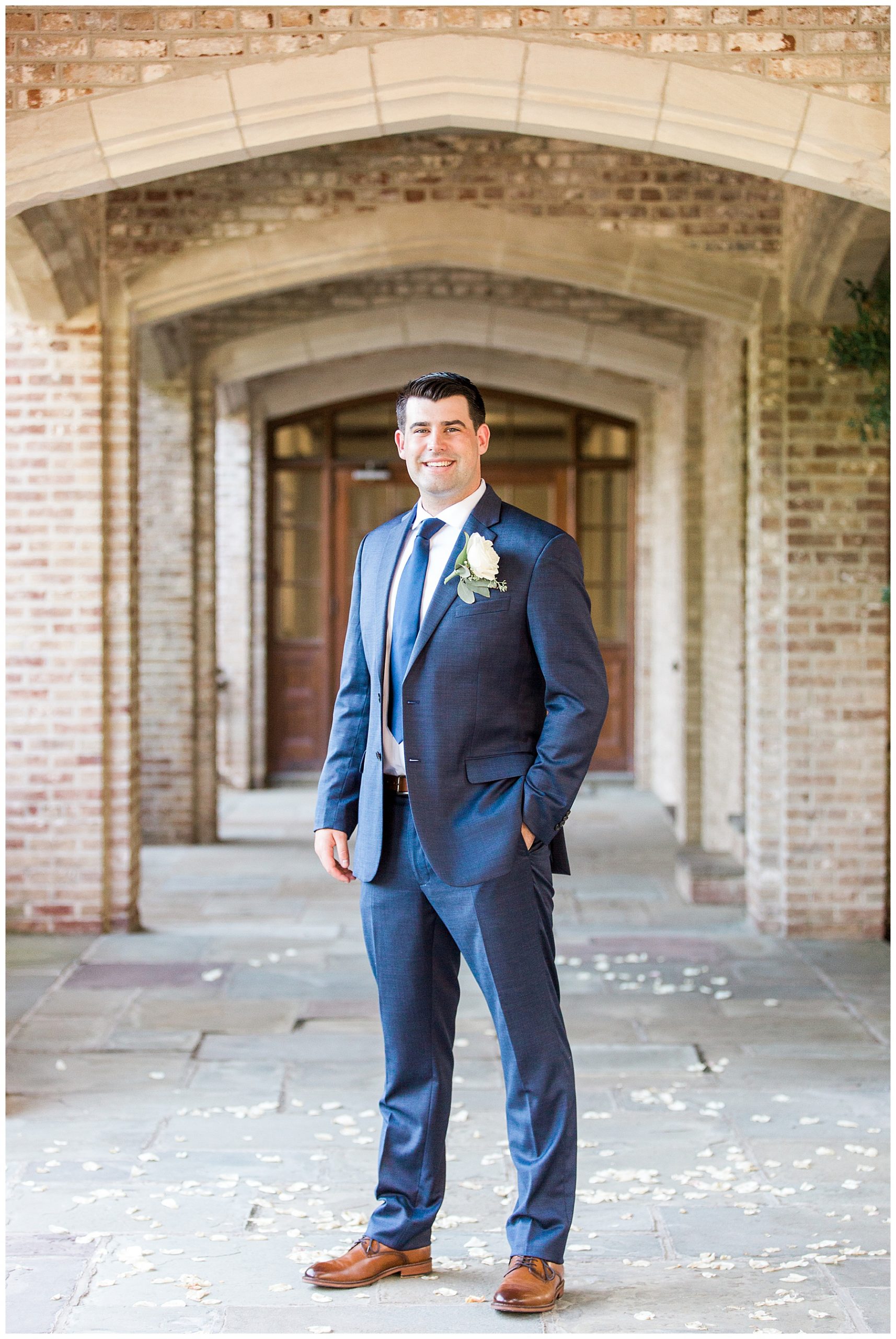 Connecticut Groom St Lukes Episcopal Church Groom Portrait in Archway