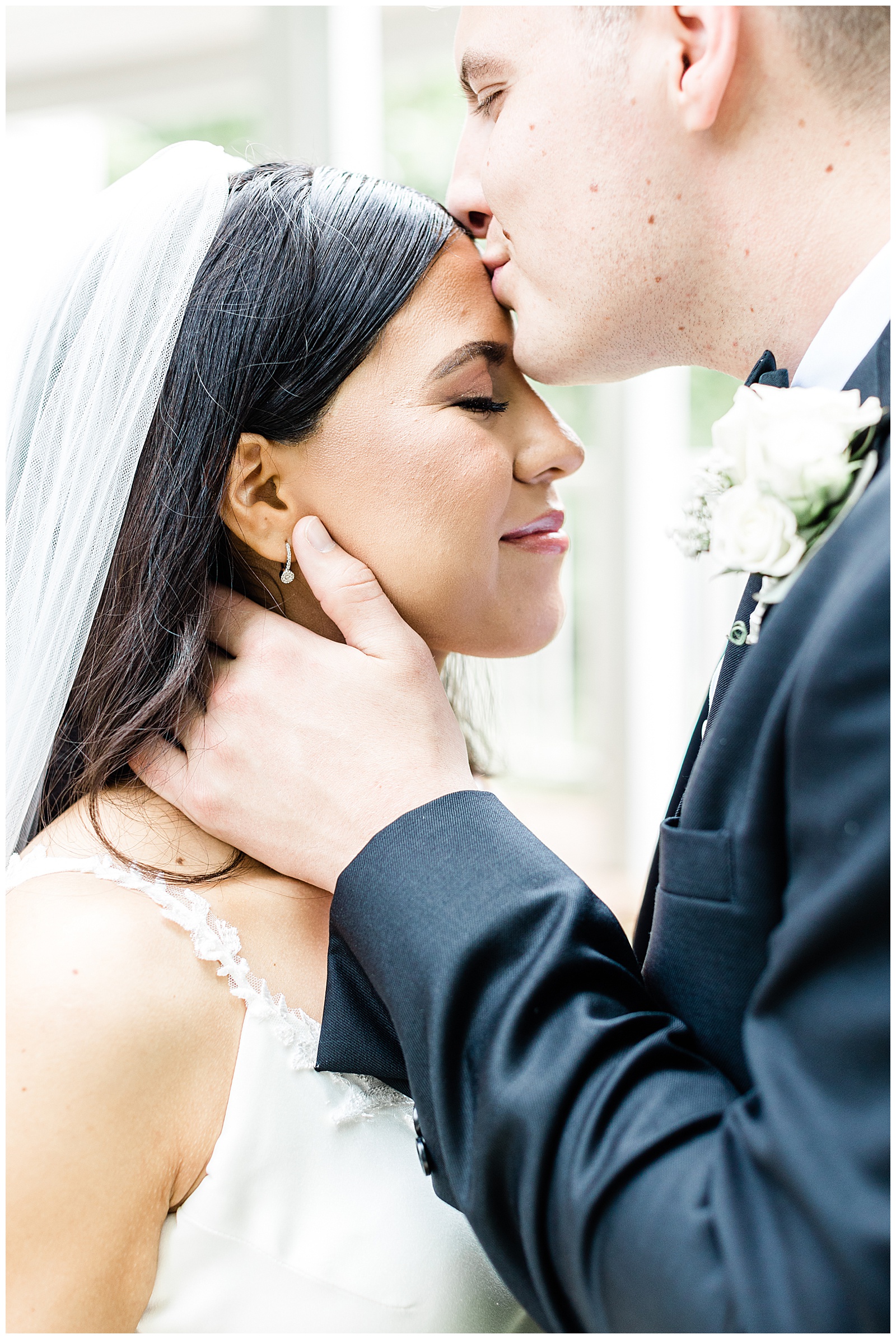 groom-kissing-bride-roger-sherman-inn.jpg